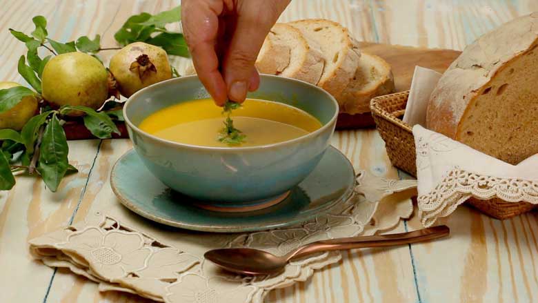 Garnish veg mulligatawny soup with fresh coriander leaves and serve hot - Mulligatawny Soup Recipe