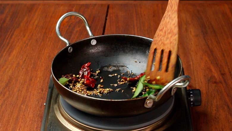Make masala powder by roasting spices in oil, then grinding to a powder - Mangalorean Chicken Sukka Recipe - Kori Sukka video