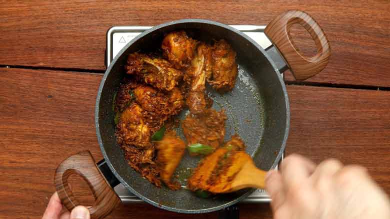 Add lime juice and curry leaves and cook till ready - Mangalorean Chicken Sukka Recipe