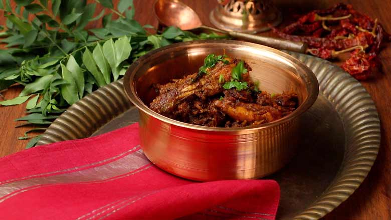 Transfer kori sukka to a serving dish, garnish with chopped coriander leaves and serve hot - Mangalorean Chicken Sukka recipe