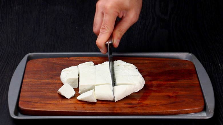 Slice the paneer into cubes or any shape as per your liking. The paneer is ready to use - How to make paneer from milk at home