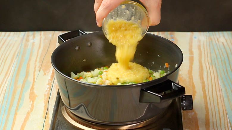 Add cooked moong dal to vegetables - Mixed Vegetable Kootu Recipe
