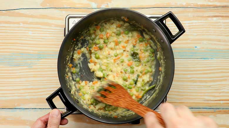 Stir in coconut milk and simmer for 2 minutes - Mixed Vegetable Kootu Recipe