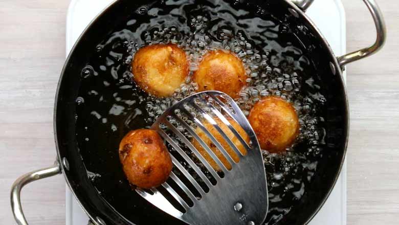 Fry till golden brown all over - Malai Kofta Recipe