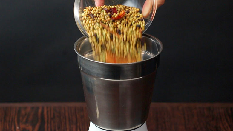 Transfer dry roasted spices and masalas to a spice grinder or small food processor - Pav Bhaji Masala Powder Homemade Recipe