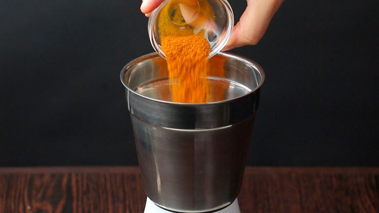 Add turmeric powder (haldi), black salt (kala namak), salt, dry ginger powder (sonth), and dried mango powder (amchur) - Pav Bhaji Masala Powder Homemade Recipe