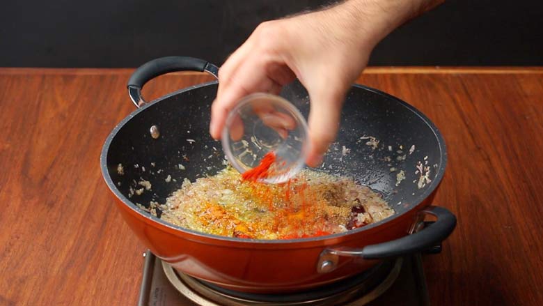 Add turmeric powder, coriander powder, and red chilli powder - Punjabi style Rajma Recipe