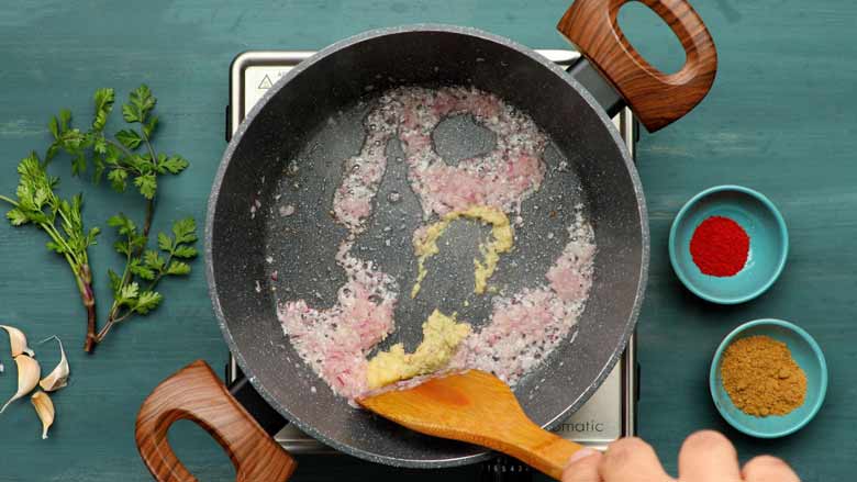 Sauté onion, garlic and ginger pastes till onion turns translucent - Aloo Chop Recipe