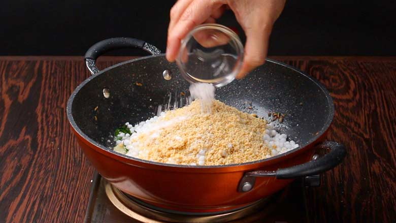 Add ground peanuts and rock salt - sendha namak - Sabudana Khichdi Recipe
