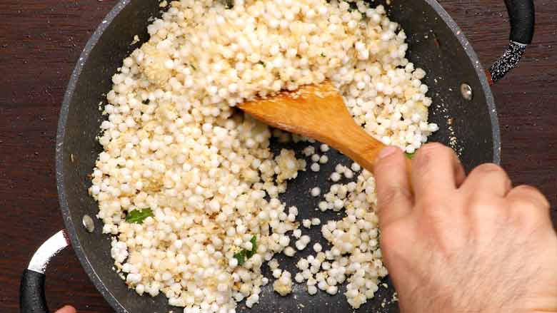 Stir sabudana well and cook for 2 minutes - Sabudana Khichdi Recipe