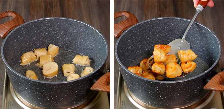 Soya chaap pieces being fried to golden brown in oil in a grey and white speckled non-stick pan with two large wooden handles on a metallic electric stove - Soya Chaap Curry recipe